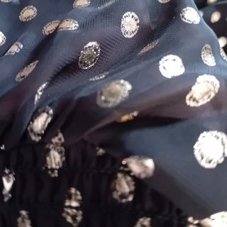 Blusa negra y dorada manga larga