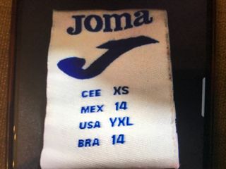 Abrigo Plumas Joma.