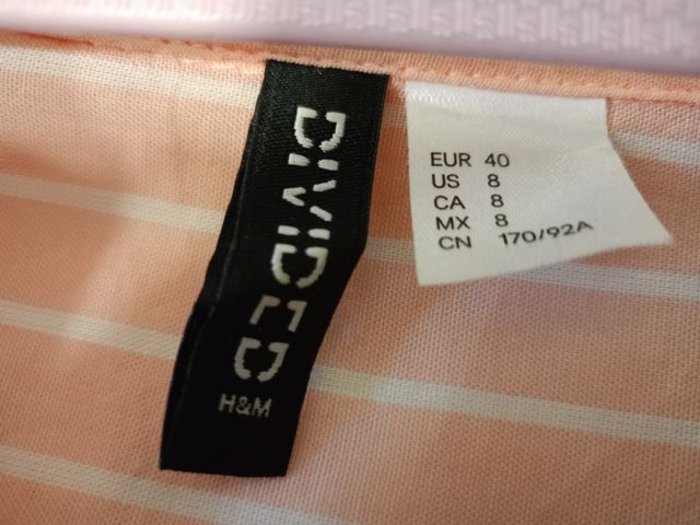 Camisa de rayas salmón y blancas