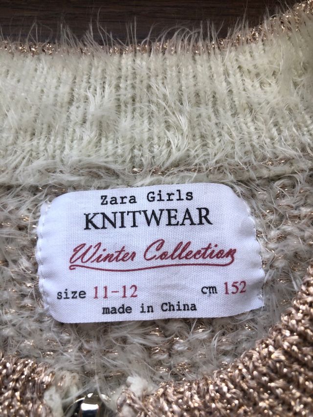 Chaqueta dorada punto