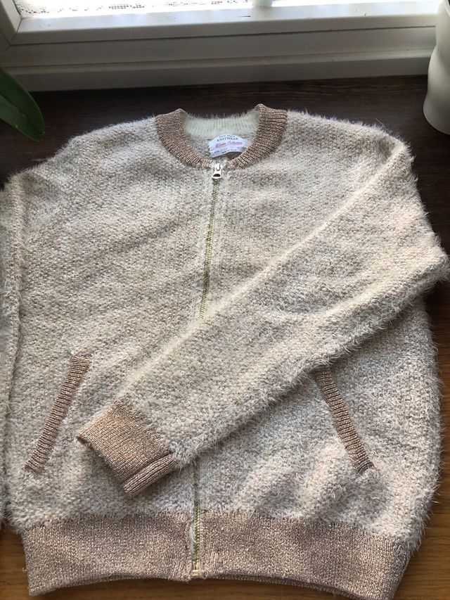 Chaqueta dorada punto