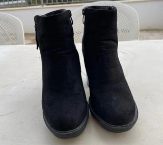 Botines con un solo uso altos de cremayera