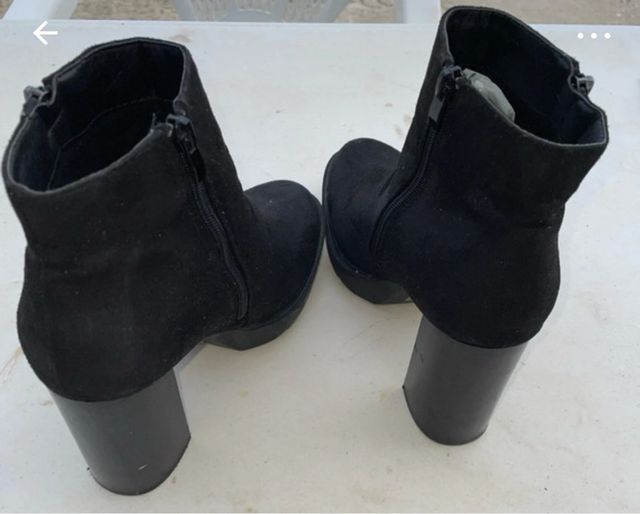 Botines con un solo uso altos de cremayera