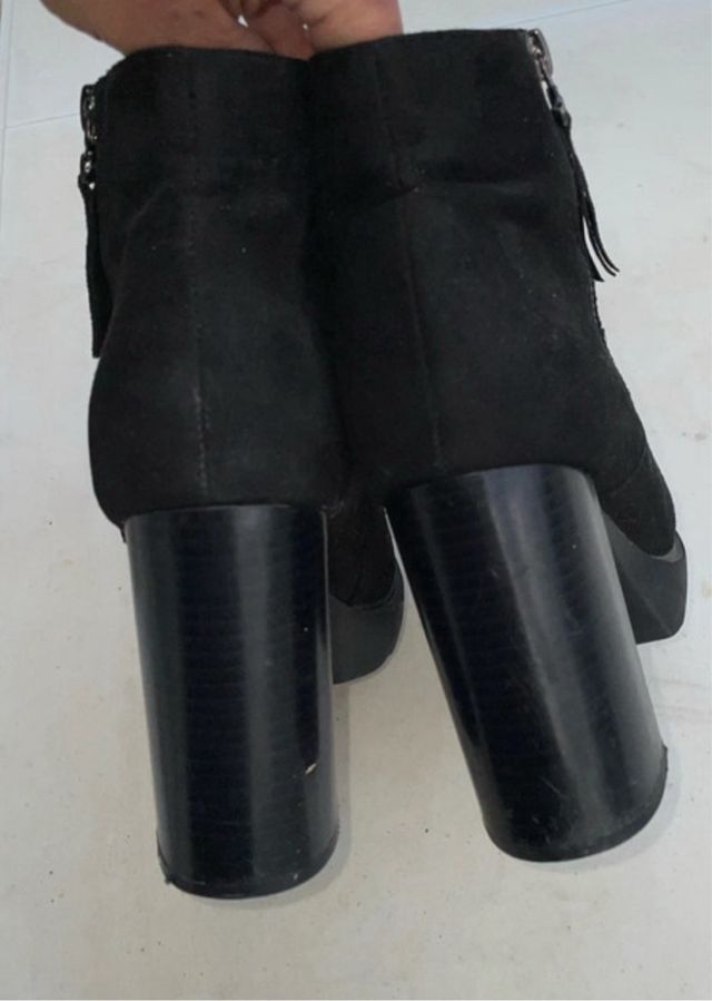 Botines con un solo uso altos de cremayera