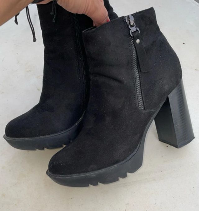 Botines con un solo uso altos de cremayera