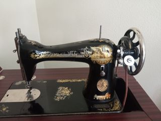 Maquina de coser Singer