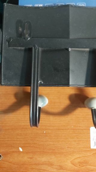 Perchero pared practicamente nuevo con ilustracion