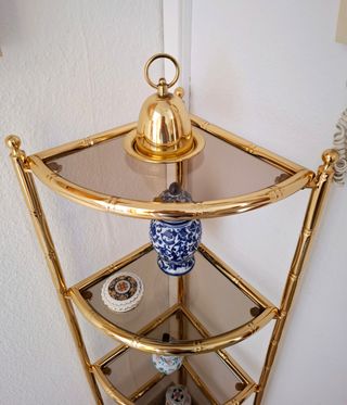 Rinconera dorada y cristal