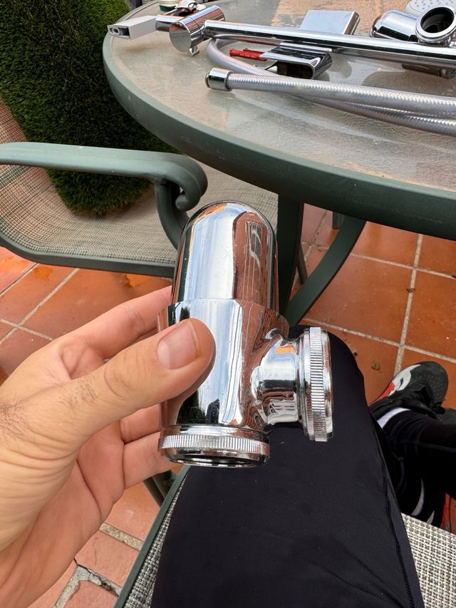 Sifón de lavabo metalico