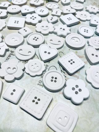 Bottoni in gesso ceramico per bomboniere