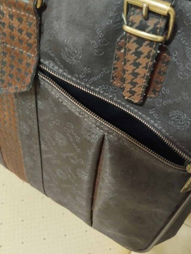 Bolso o maleta de mano 