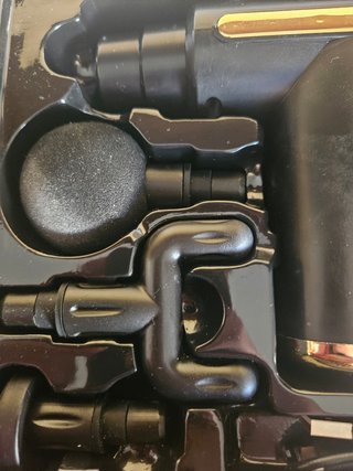 Pistola de masajes