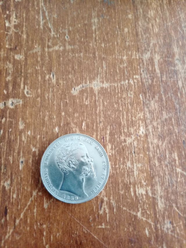 Riproduzione moneta lire5