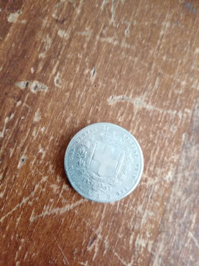 Riproduzione moneta lire5