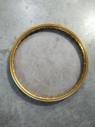 Llanta aluminio dorada Derbi