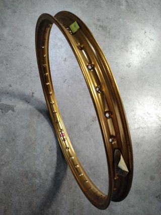 Llanta aluminio dorada Derbi