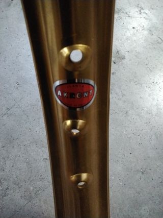 Llanta aluminio dorada Derbi