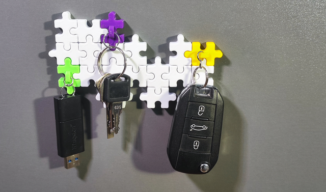 Organizador de llaves en forma de puzzle