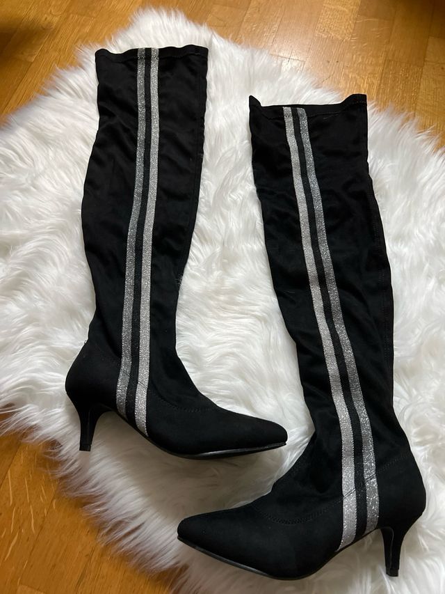 Stivali alti con tacco