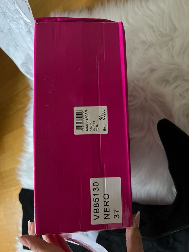 Stivali alti con tacco