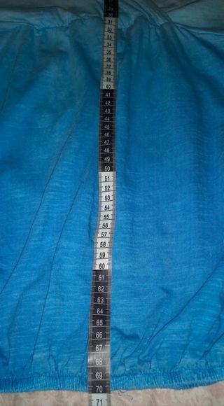 Camiseta Turquesa de tirantes de mujer.