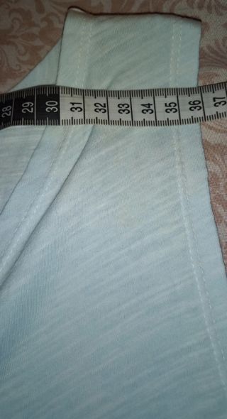 Camiseta Turquesa de tirantes de mujer.