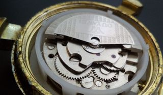 Antiguo reloj automático para caballero