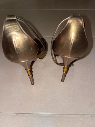 Gucci bronce metálico