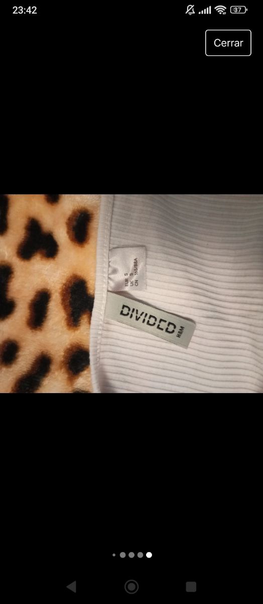 Top de manga larga blanco con cremallera