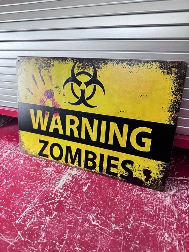 Cartel de chapa Peligro Zombies Warning
