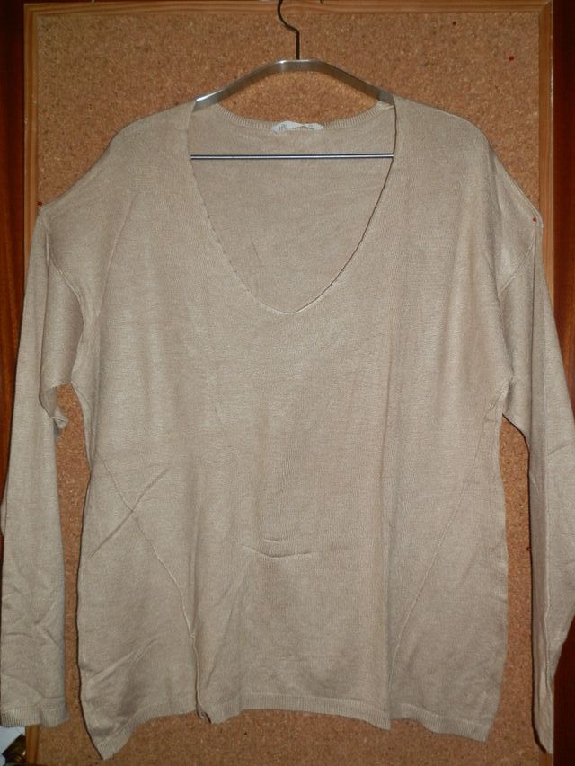 Sweter fino escote V