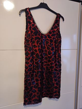 Vestido corto de fiesta con brillo marca Zara
