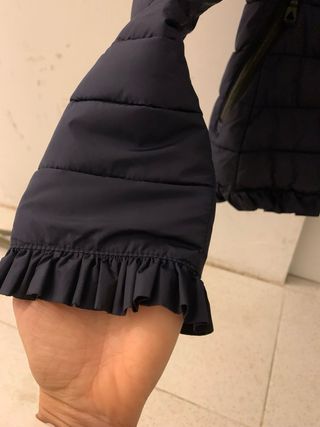 Plumifero mujer