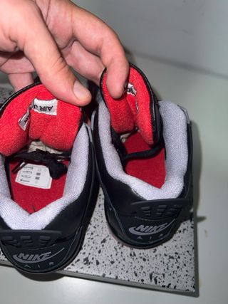 Jordan 4 bred niño