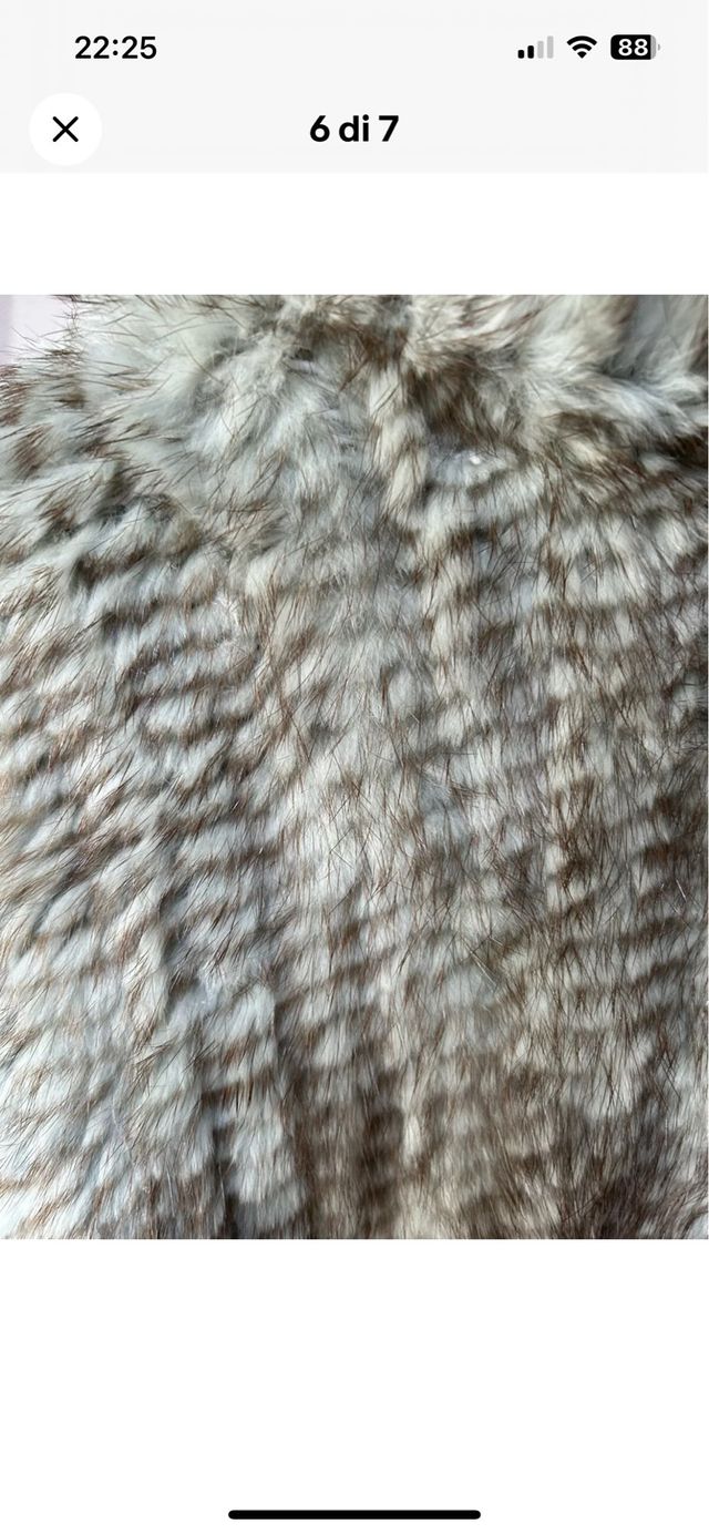 Blusa in pelliccia a maglia grigio azzurra