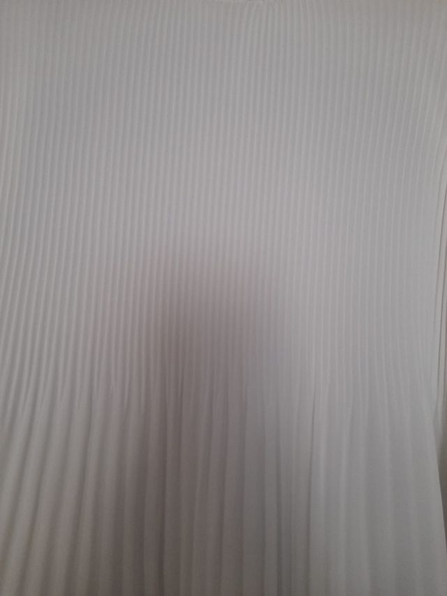 Blusa de gasa blanca