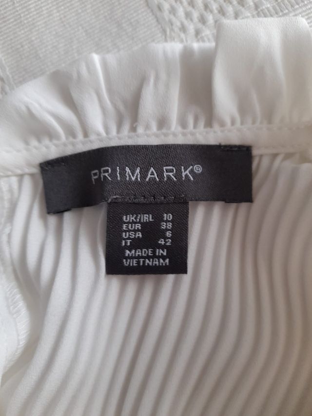 Blusa de gasa blanca