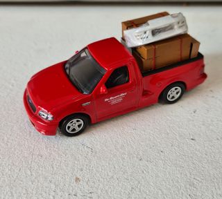 A todo gas ford f150 hotwheels supra mini gt ixo