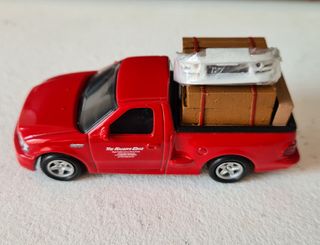A todo gas ford f150 hotwheels supra mini gt ixo