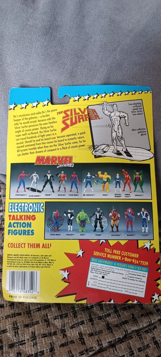 Statuetta da surfista giocattolo in argento