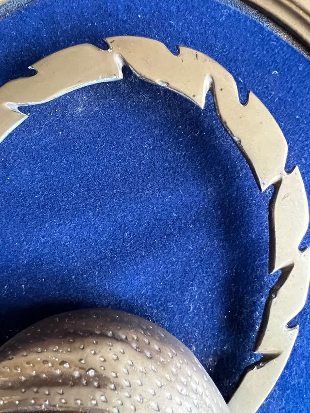 ovalo Miguel Angel de bronce