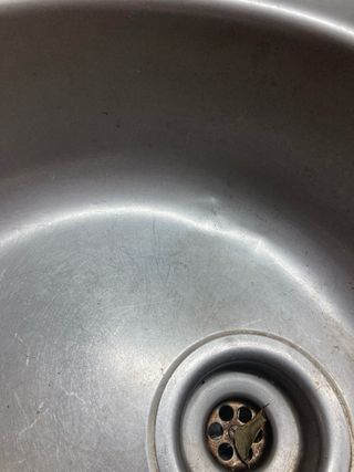 Fregadera con grifo
