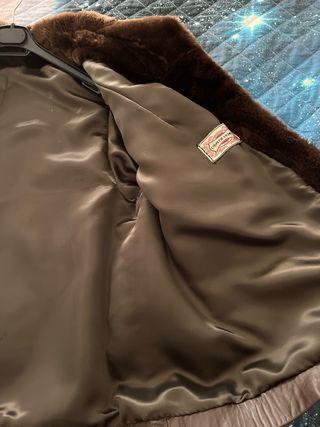 Chaqueta de mujer de piel y mutón
