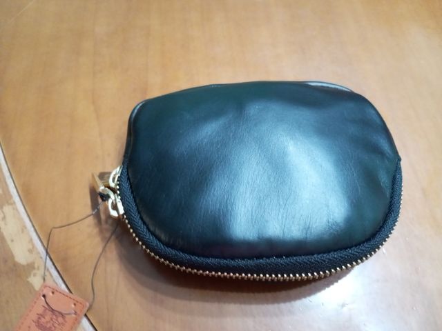 Monedero de piel con pelo potro