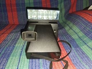 Polaroid Land 1000 botón verde