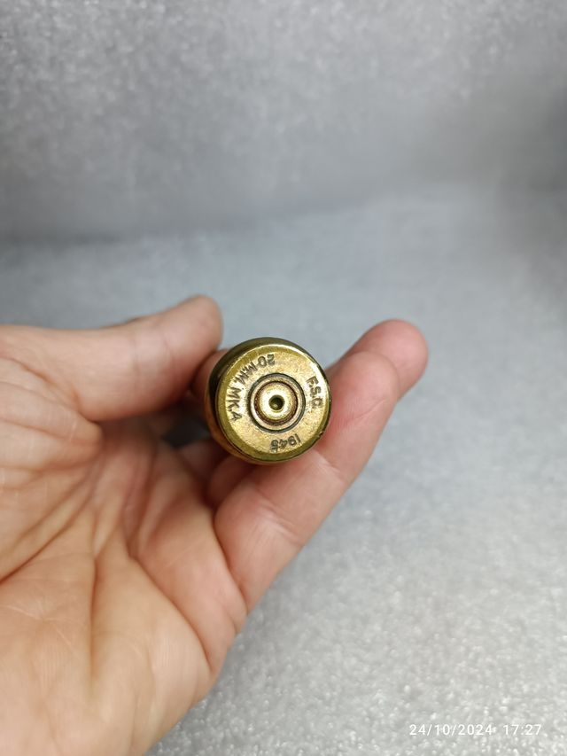 Cartucho inerte de proyectil.