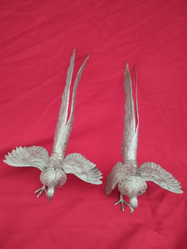 Dos pájaros de metal