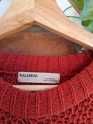 Jersey con borlitas. Color marron/Teja