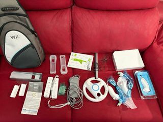 Wii con muchos accesorios y mochila