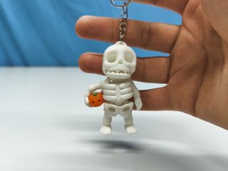 Porta-chaves esqueleto com abóbora